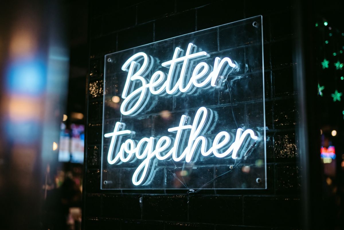 Neon sign reading Better together